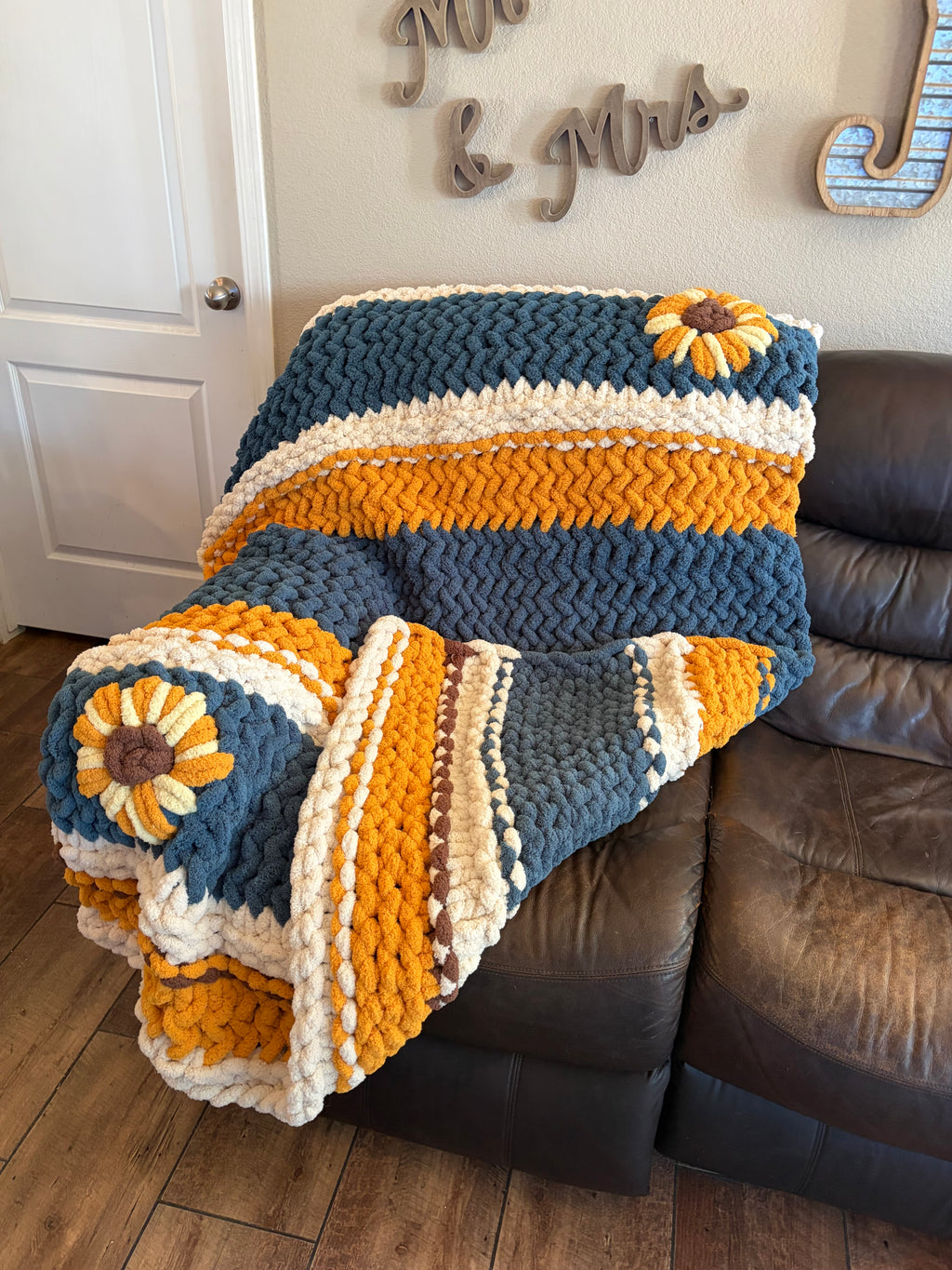 Fields of Grace Chunky Hand Knit Blanket Pattern | 45” x 70” | Herringbone Stitch + Sunflower Embellishment